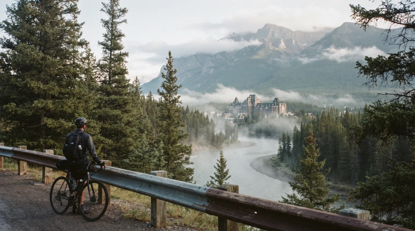 A traveller planning Banff in 1 day with the Sulphur Mountain summit boardwalk above the Bow Valley.